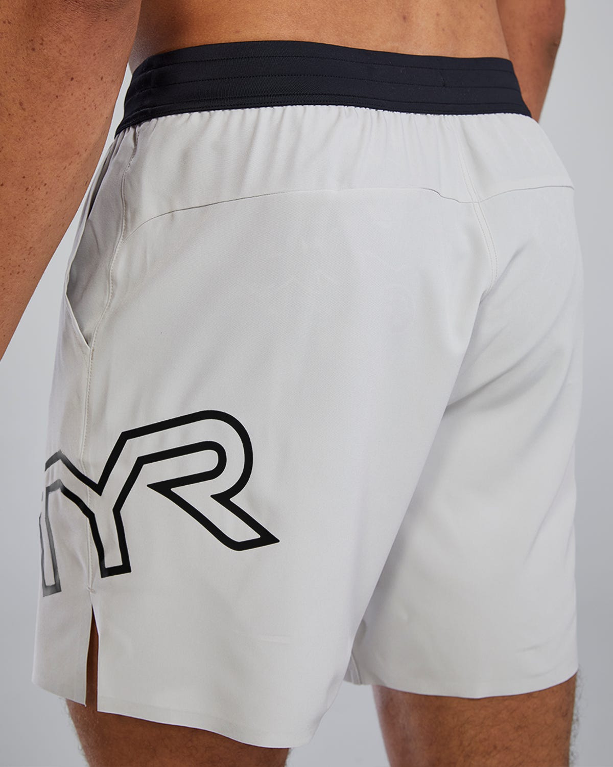 TYR Hydrosphereª Men's Unlined 7" Unbroken Big Logo Shorts - Solid
